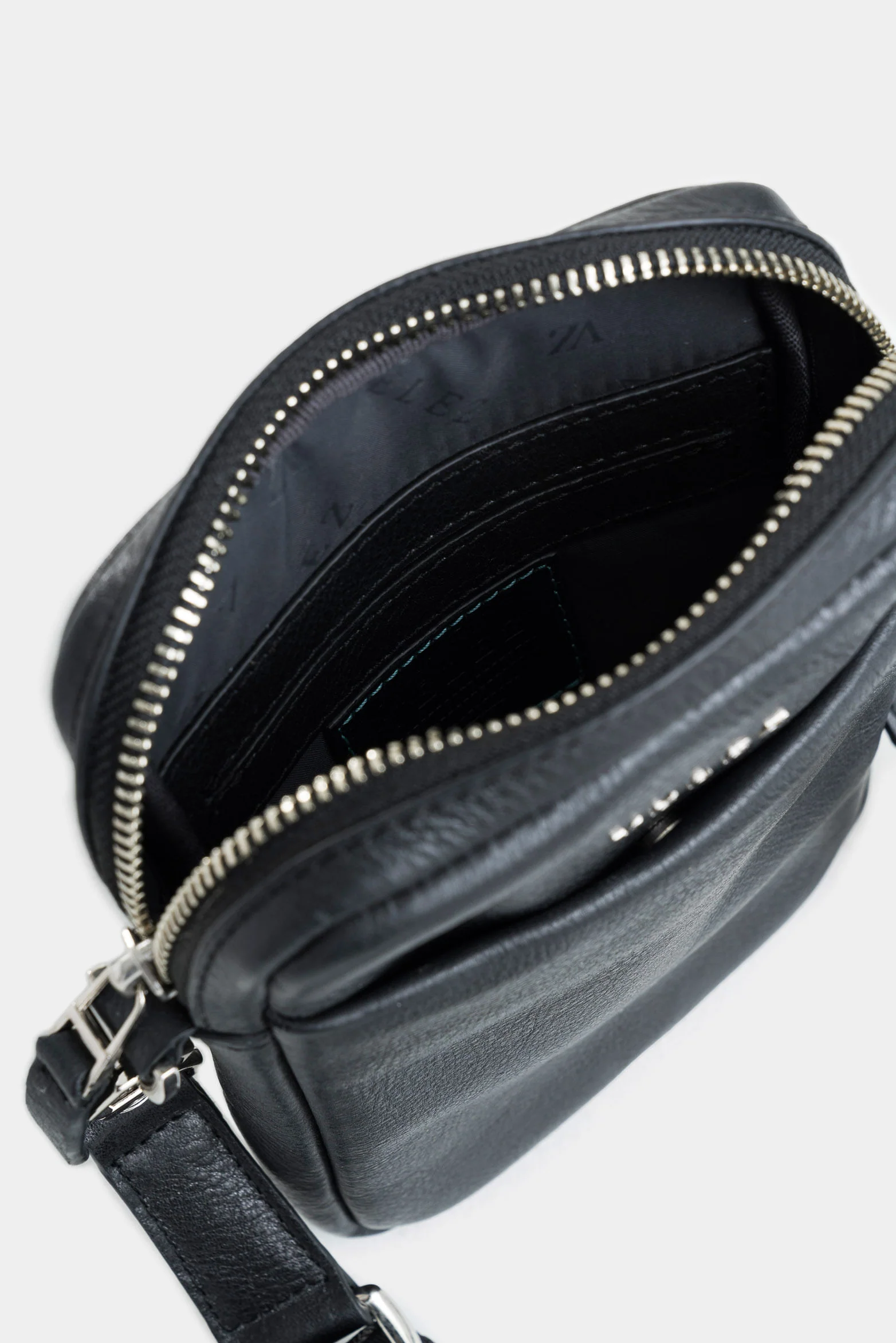 Mini Lugano Leather Hands-Free Bag with Monochrome Silhouette for Men - Image 5